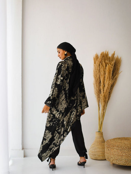 Black asymmetrical draped top